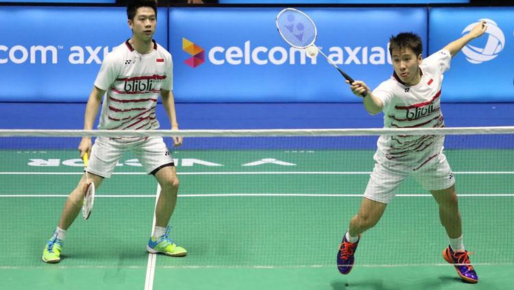 Pasangan ganda putra Indonesia, Marcus Fernaldi Gideon/Kevin Sanjaya Sukamuljo di ajang Malaysia Super Series Premier 2017. - INDOSPORT