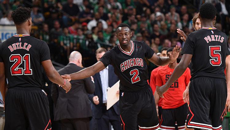 Pemain Bulls, Bobby Portis #5, Jerian Grant #2, dan Jimmy Butler #21. - INDOSPORT