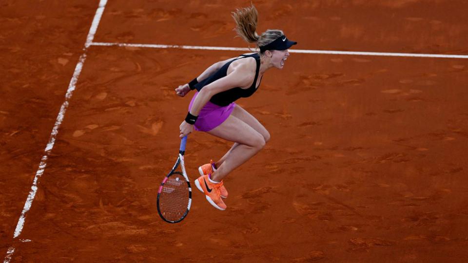 Ekspresi kemenangan Eugenie Bouchard saat mengalahkan Maria Sharapova di Madrid Terbuka. - INDOSPORT