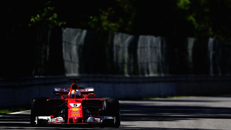Pembalap Ferrari, Sebastian Vettel. - INDOSPORT