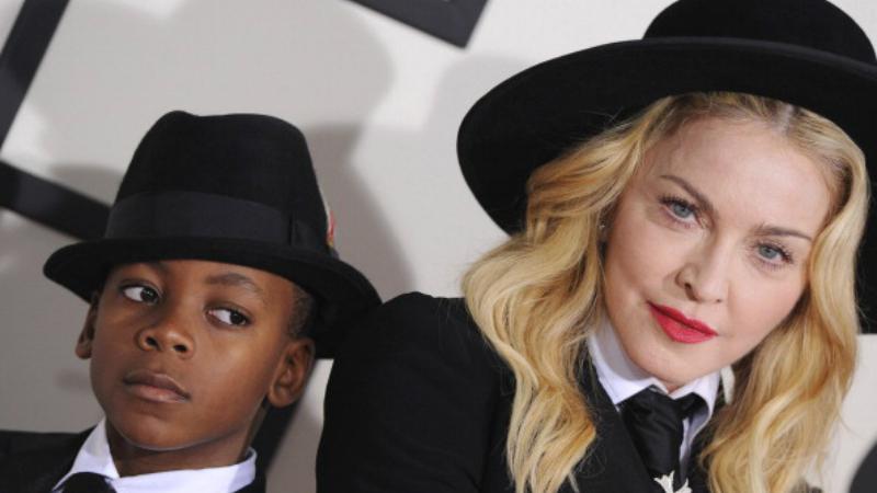 Madonna dan anak angkatnya, David Banda. - INDOSPORT