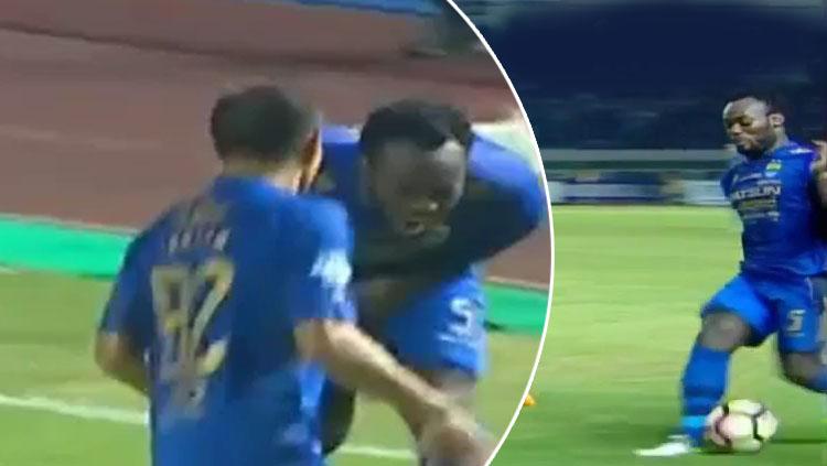 Michael Essien kesakitan karena tembakan bola Rohit Chand mengenai kemaluannya. - INDOSPORT