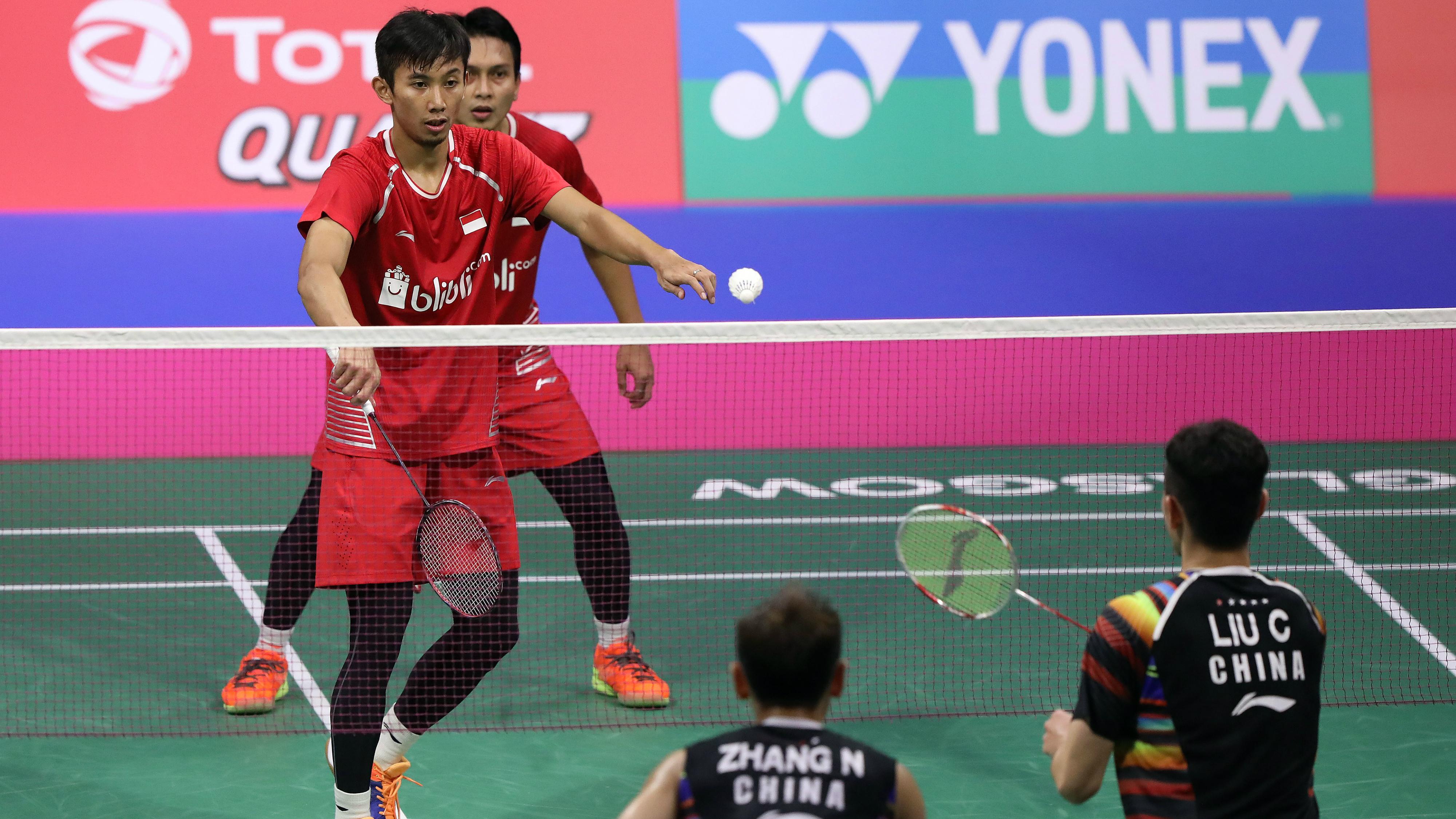 Mohammad Ahsan/Rian Agung Saputro saat melawan Liu Cheng/Zhang Nan. - INDOSPORT