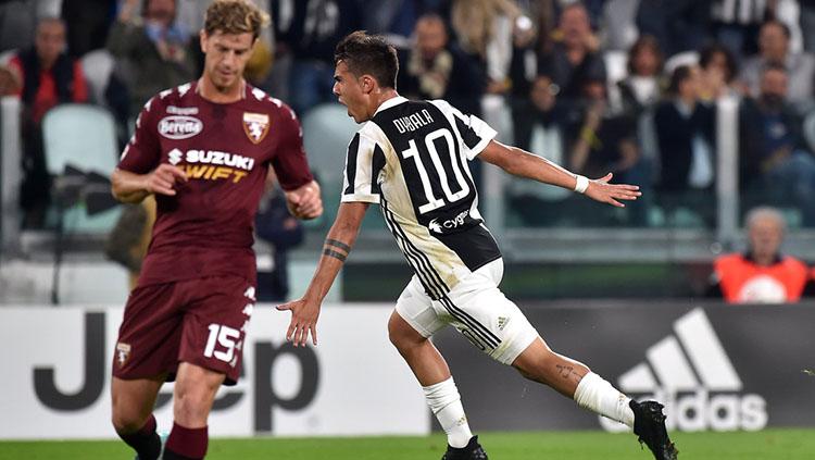 Selebrasi Dybala usai mencetak gol ke gawang Torino. - INDOSPORT