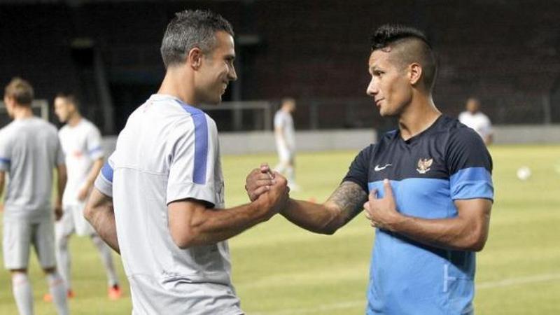 Indosport - Maitimo dan Robin van Persie.