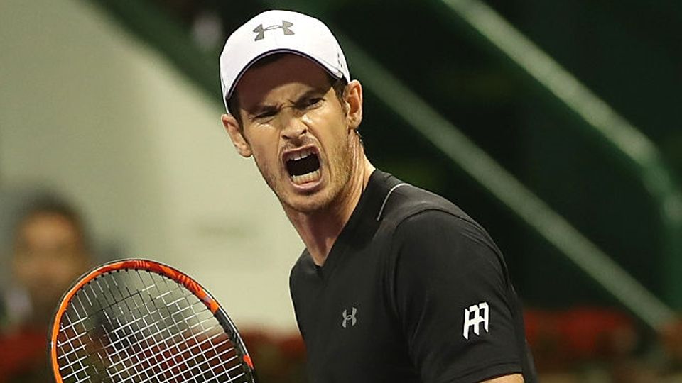 Andy Murray selebrasi dalam pertandingan ATP Qatar Open 2017. Copyright: KARIM JAAFAR/AFP/Getty Images