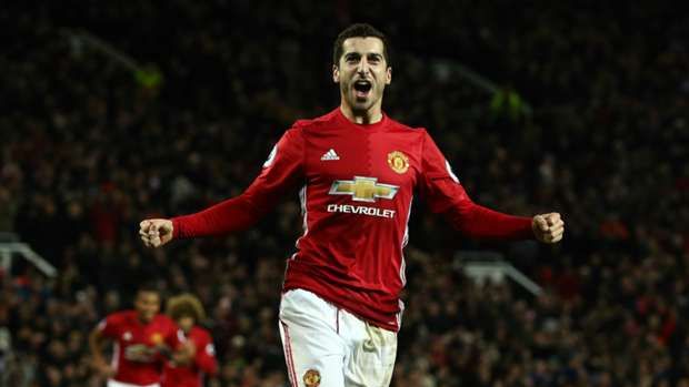 Henrikh Mkhitaryan berselebrasi merayakan gol yang dicetaknya. Copyright: Goal