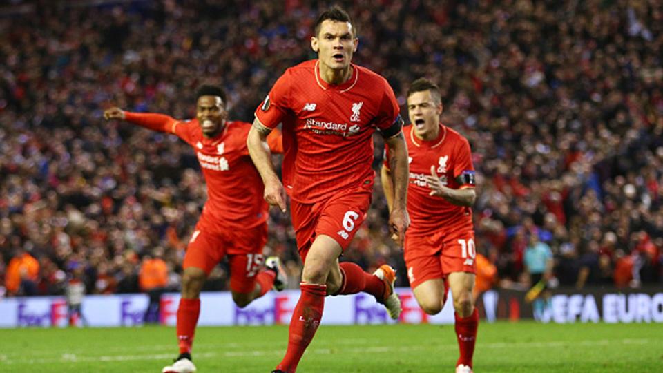 Pemain belakang Liverpool, Dejan Lovren sedang melakukan selebrasi gol. Copyright: INTERNET