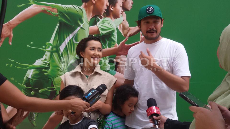 Dwi%20Sasono%20dan%20Widi%20Mulia%20bersama%20kedua%20anaknya%20saat%20mengikuti%20lomba%20lari%20di%20kawasan%20Kuningan%2C%20Jakarta.