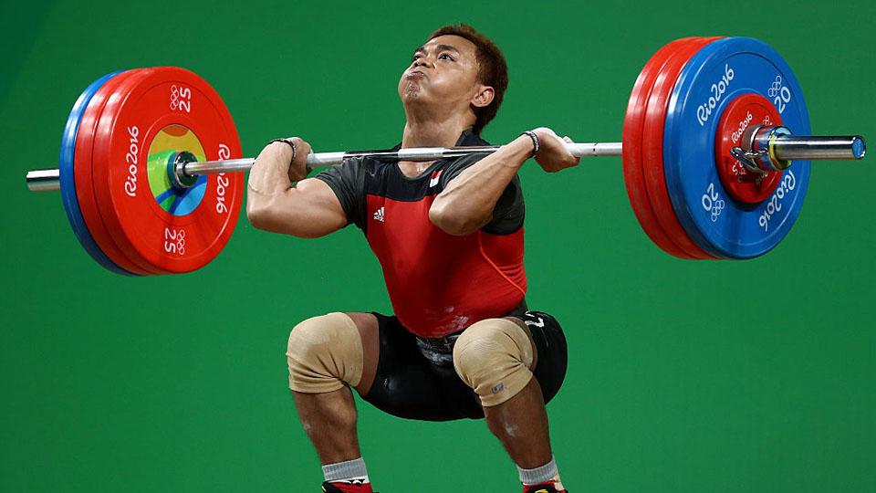 Atlet Angkat Berat-Besi, Eko Yuli Irawan berusaha keras untuk menyumbang medali untuk Indonesia. Copyright: INTERNET