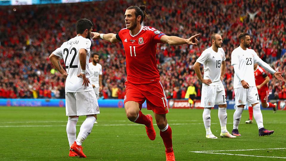 Gareth Bale dari Wales merayakan golnya setelah menjebol gawang Georgia. Copyright: Internet