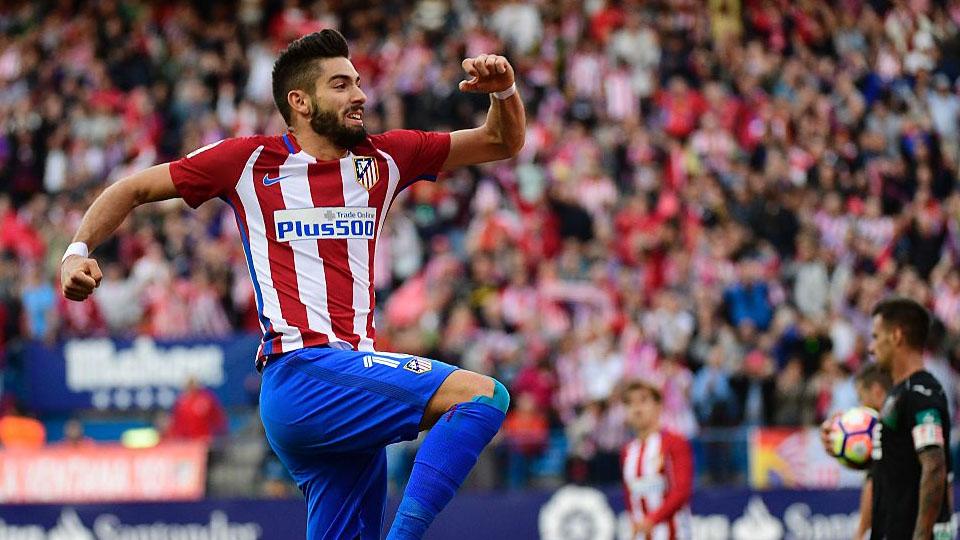 Aksi selebrasi Yannick Ferreira Carrasco setelah mencetak dua gol ke gawang Granada. Copyright: INTERNET