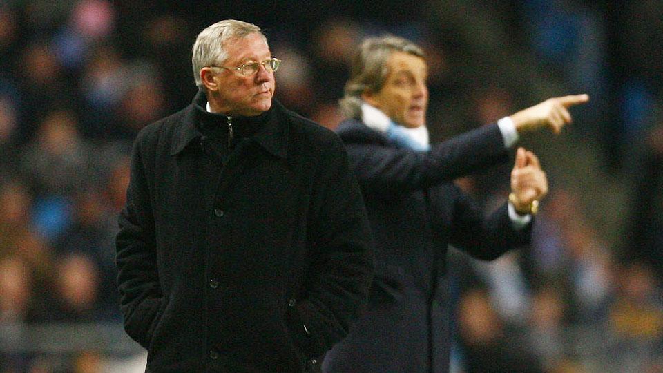 Sir Alex Ferguson dan Roberto Mancini dari pinggir lapangan (19/01/10) Copyright: INTERNET