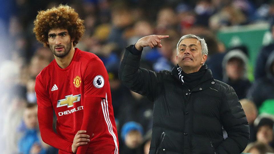 Marouane Fellaini dan Jose Mourinho - INDOSPORT