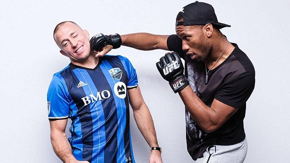 Penyerang Montreal Impact, Didier Drogba (kanan) dan Georges St-Pierre. - INDOSPORT