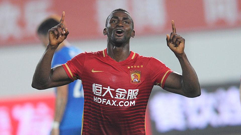 Mantan pemain Atletico Madrid, Jackson Martinez melakukan selebrasi bersama klub barunya, Guangzhou Evergrande Copyright: VCG/VCG via Getty Images