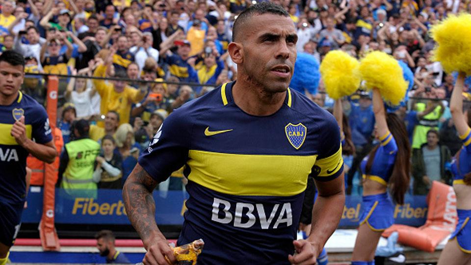 Penyerang Carlos Tevez saat masih memperkuat Boca Juniors. Copyright: Alejandro Pagni/Getty Images