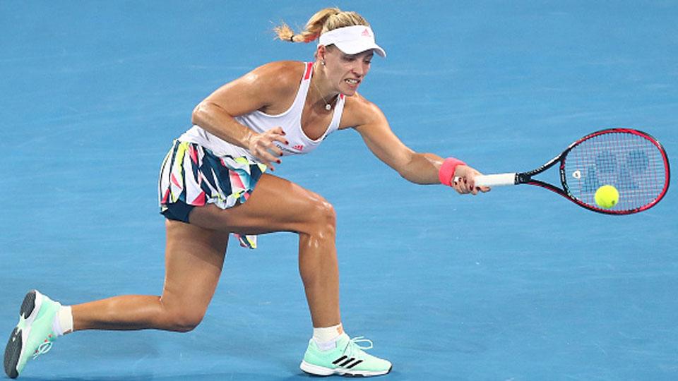 Angelique Kerber menahan bola dari Elina Svitolina. Copyright: Chris Hyde/Getty Images