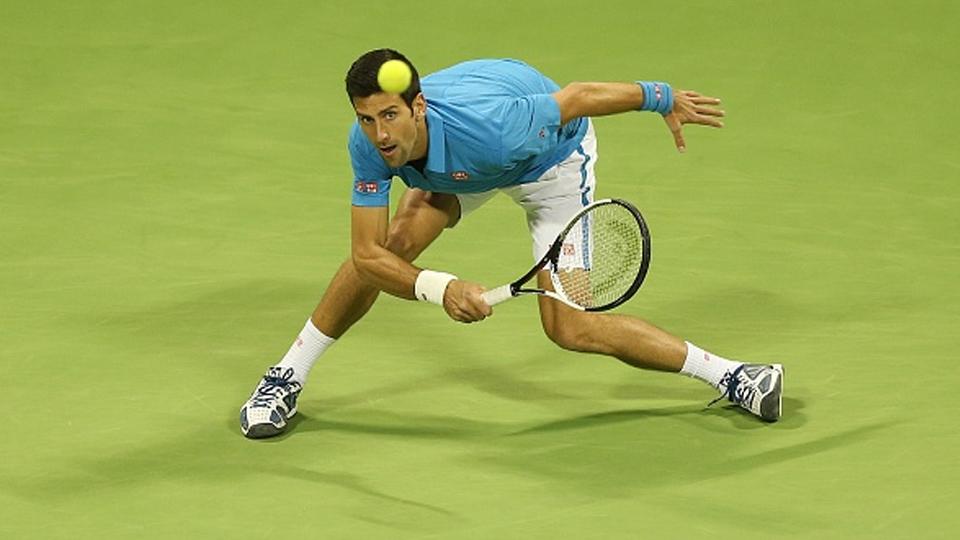 Novak Djokovic berhasil lolos ke babak final Qatar Open. - INDOSPORT