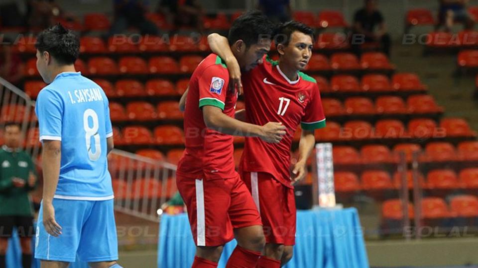 Timnas Futsal Indonesia saat menghadapi Laos. - INDOSPORT