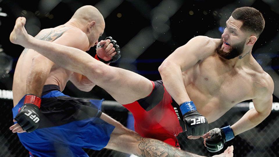 Petarung Amerika Serikat, Jorge Masvidal (kanan), resmi ditunjuk untuk menjadi lawan Kamaru Usman di ajang UFC 251 yang akan digelar di Fight Island 12 Juli nanti. - INDOSPORT