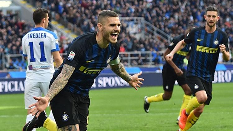 Aksi selebrasi Mauro Icardi usai bobol gawang Atalanta. Copyright: GIUSEPPE CACACE/AFP/Getty Images