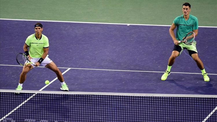 Rafael Nadal dan Bernard Tomic. - INDOSPORT