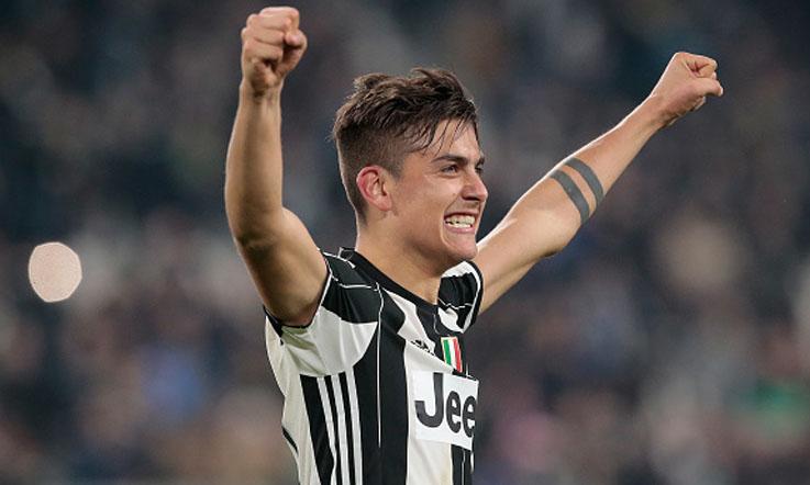 Penyerang Juventus, Paulo Dybala melakukan selebrasi. Copyright: Emilio Andreoli/Getty Images