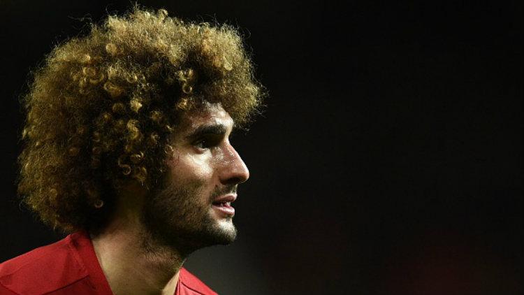 Gelandang Manchester United, Marouane Fellaini. Copyright: OLI SCARFF/AFP/Getty Images