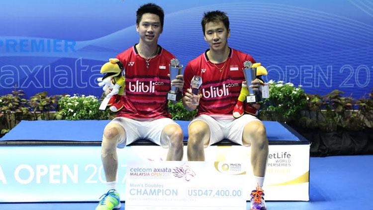 Kevin Sanjaya/Marcus Gideon sukses meraih gelar juara ganda putra Malaysia Open Super Series Premier 2017 sekaligus mengukir hattrick juara Super Series beruntun di tahun 2017. Copyright: HUMAS PBSI