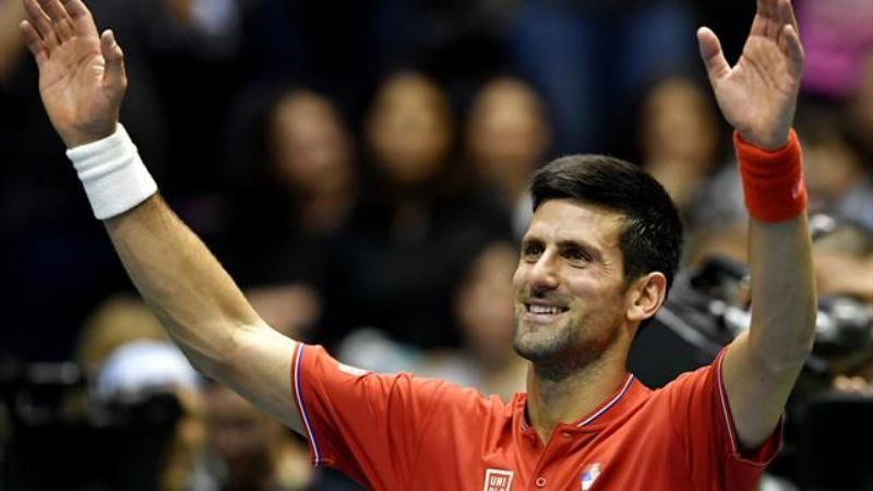 Novak Djokovic saat membawa Serbia unggul atas Spanyol di perempatfinal Piala Davis 2017. Copyright: Reuters