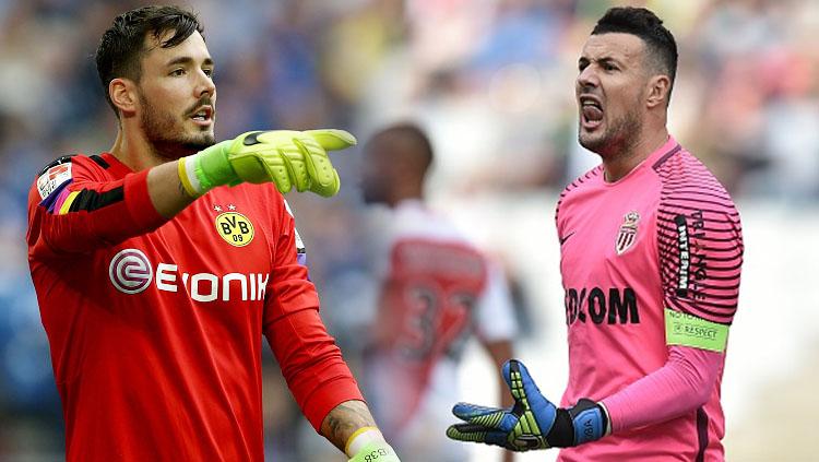 Danijel Subasic (kanan) dan Roman Buerki. Copyright: JEAN-SEBASTIEN EVRARD/AFP/Lars Baron/Bongarts/Getty Images