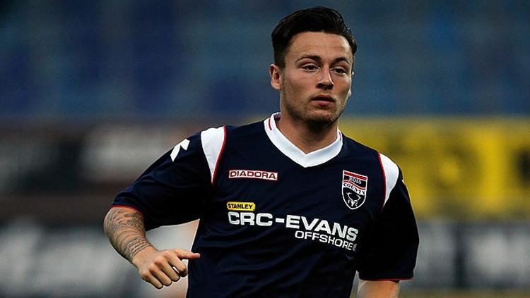 Indosport - Klok saat masih membela Ross County melawan PEC Zwolle.
