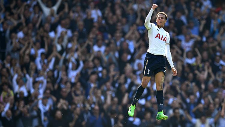 Aksi Dele Alli saat merayakan gol. - INDOSPORT