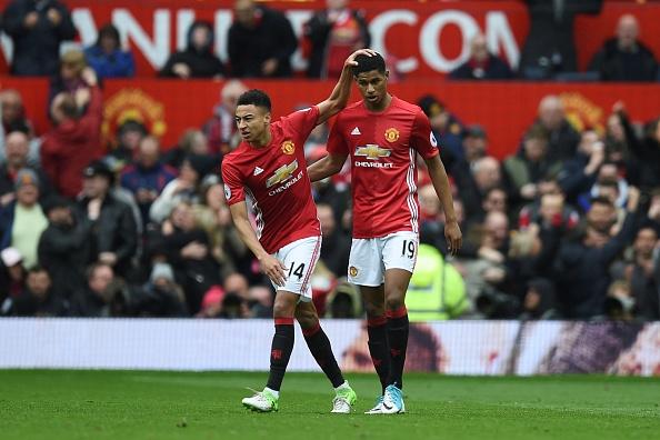 Bintang Manchester United, Jesse Lingard dan Marcus Rashford. Copyright: OLI SCARFF/AFP/Getty Images