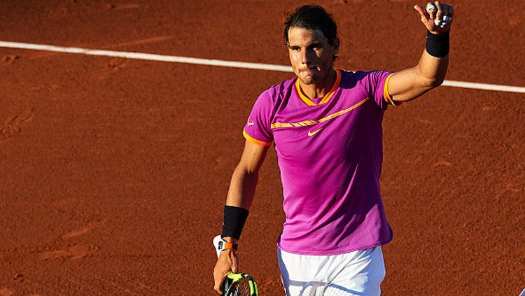 Ekspresi Rafael Nadal setelah memenangkan pertandingan. - INDOSPORT