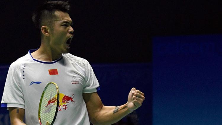 Tunggal putra China, Lin Dan melakukan selebrasi. Copyright: Allsport Co./Getty Images