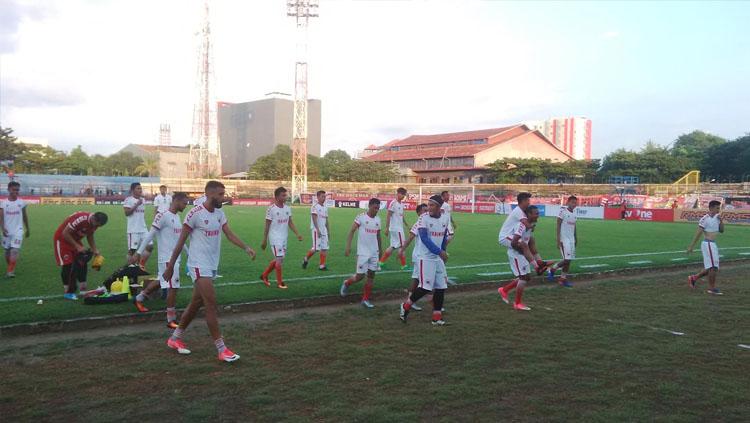 Para pemain Persija Jakarta saat memulai sesi latihan di Stadion Mattoangin, Makassar. Copyright: Muhammad Nur Basri/INDOSPORT
