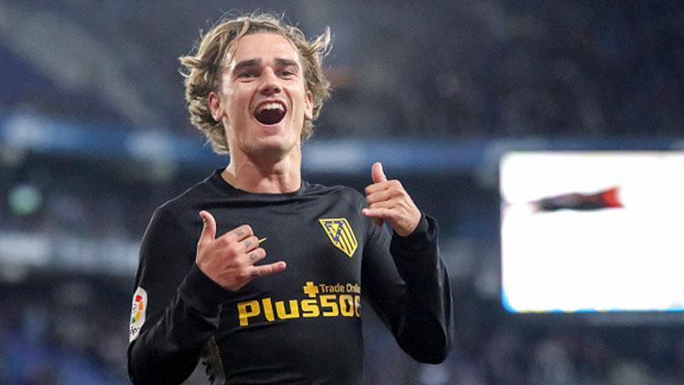 Antoine Griezmann selebrasi pada laga saat melawan Espanyol.