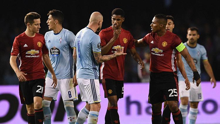 Rashford dan Guidetto beradu mulut di atas lapangan. - INDOSPORT