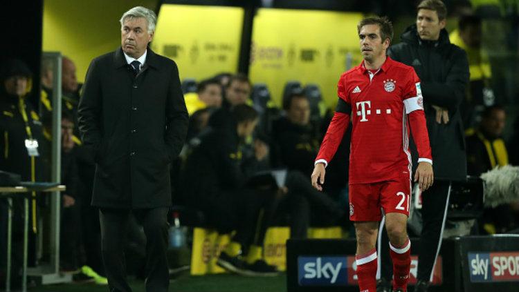 Pelatih Bayern Munchen, Carlo Ancelotti beserta kapten Die Roten, Philipp Lahm. Copyright: Stefan Matzke - sampics/Corbis via Getty Images