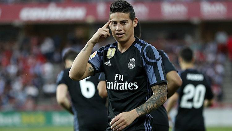 Gelandang Real Madrid, James Rodriguez melakukan selebrasi. Copyright: Angel Martinez/Real Madrid via Getty Images