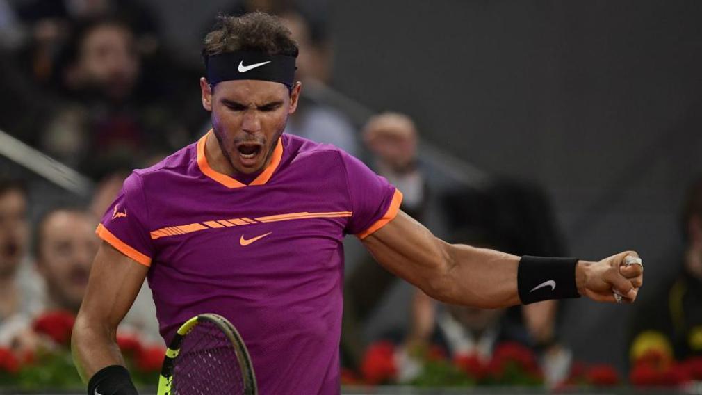 Rafael Nadal berhasil mengalahkan Novak Djokovic di babak semifinal Madrid Terbuka 2017. - INDOSPORT