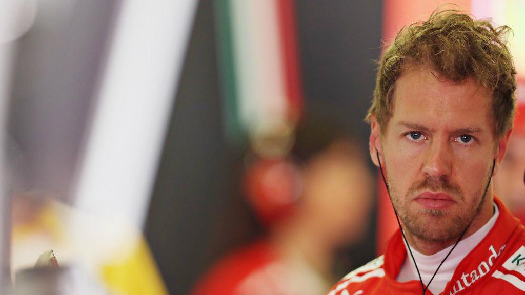 Pembalap Ferrari, Sebastian Vettel. - INDOSPORT