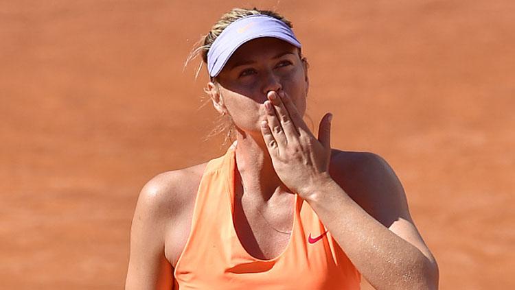 Maria Sharapova melakukan selebrasi.