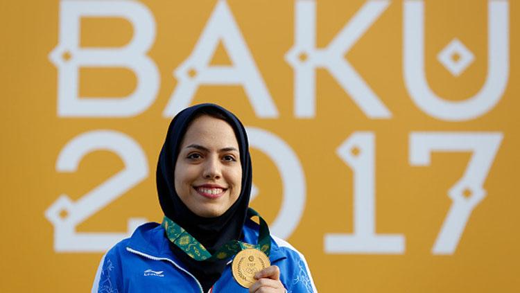 Atlet cabang Tembak Iran, Golnoush Sebghatollahi. Copyright: JOHANNA LEGUERRE/AFP/Getty Images