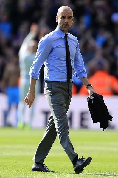Pelatih Man City, Pep Guardiola. Copyright: Richard Heathcote/Getty Images