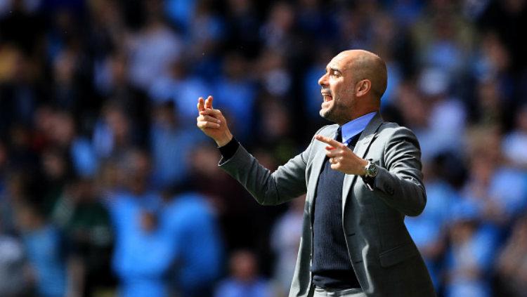 Pelatih Manchester City, Pep Guardiola. Copyright: Richard Heathcote/Getty Images