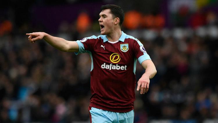 Bek andalan Burnley, Michael Keane mengungkapkan tim yang bakal dibelanya musim depan. Copyright: Stu Forster/Getty Images