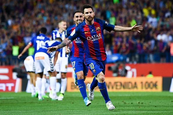 Lionel Messi merayakan gol pertamanya. Copyright: Getty Images